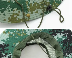 Detail of digital camouflage boonie hat featuring breathable mesh lining and windproof strap