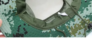 Detailed view of digital camo boonie hat featuring 100% polyester mesh lining and strap