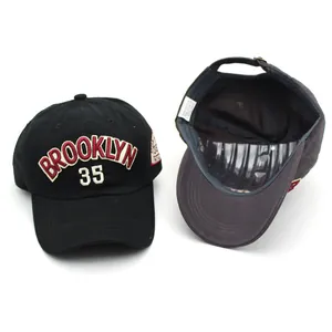 Black canvas baseball cap with Brooklyn 35 embroidery and adjustable metal buckle strap