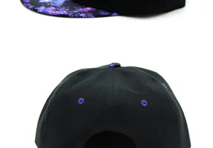 Detail of galaxy print on flat brim and rear view of black canvas snapback baseball cap