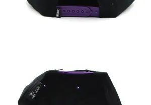 Detail of black snapback hat with purple plastic closure and inner size tag label