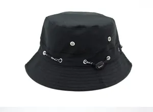 Detail of black outdoor sun hat featuring metal eyelets and SPORT printed drawstring cord