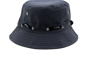 Close-up of canvas sun hat with metal eyelets and decorative SPORT lettered drawstring