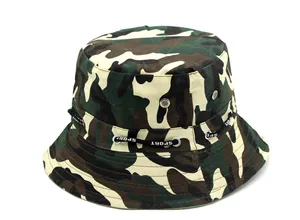 Detail view of camouflage sun hat with metal eyelets and SPORT printed decorative strap