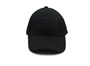 Detailed view of tactical black American flag embroidery on premium cotton twill baseball cap