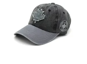 Detail of dark grey washed cotton baseball cap with maple leaf patch and side embroidery