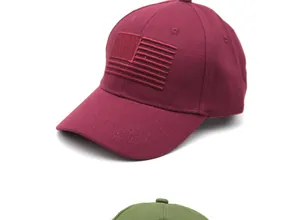 Close-up of American flag embroidery on twill cotton baseball caps in burgundy and green