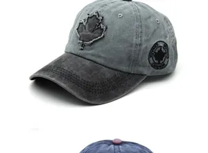 Detailed close-up of Canada maple leaf embroidery and worn effect on washed cotton cap
