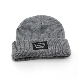 Gray ribbed knit beanie with slogan patch for men and women, trendy streetwear winter hat