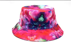 Close-up of tie-dye bucket hat featuring multi-colored patterns and multi-row brim stitching
