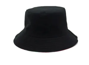 Detail of a black cotton bucket hat showing a multi-color patterned interior lining