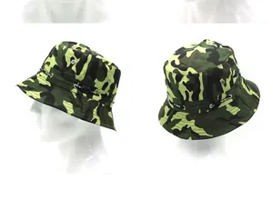Detail of camouflage boonie hat featuring metal eyelets and a SPORT brand strap