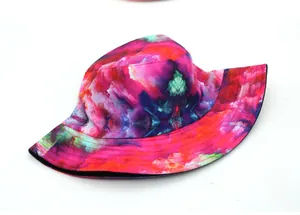 Detail view of colorful tie-dye bucket hat showing multi-row stitching on the wide brim