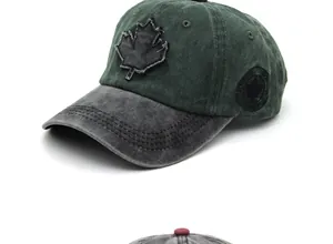 Detail of vintage washed cotton baseball cap with embroidered maple leaf and Canada patch