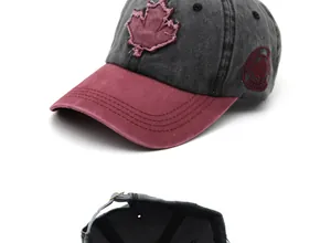 Detail of embroidered Canada maple leaf patch on vintage washed cotton baseball cap