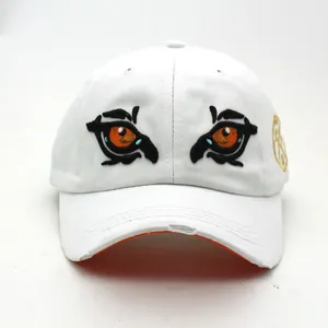 White washed cotton baseball cap with tiger eye embroidery and distressed brim details