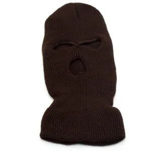 Close-up of knit texture and reinforced eye holes on dark brown three-hole face mask