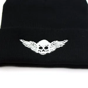 Black knit beanie with white skull and wings embroidery for outdoor winter warmth