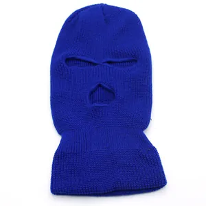 Detailed texture of dark blue three-hole knitted balaclava with vertical ribbed pattern