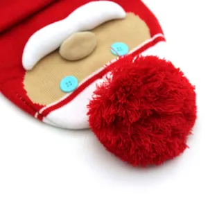 Kids knitted Santa Claus Christmas hat with red plush ball and white beard detail