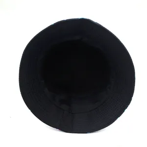 Detailed interior view of a black cotton bucket hat showing stitching and lining details