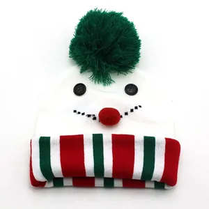 Kids knitted snowman Christmas hat with green pompom and festive striped brim