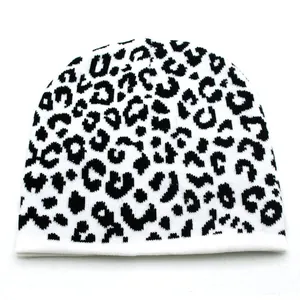 Unisex black and white leopard print knit beanie hat for winter warmth in soft fabric