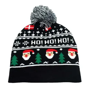 Jacquard knit Christmas beanie with HO HO HO slogan and festive Santa Claus patterns