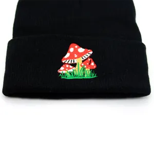Black knit beanie with mushroom embroidery, warm winter skull cap for men and women