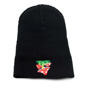 Black knit beanie with colorful mushroom embroidery for men and women winter warmth