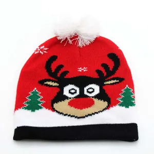 Red knit Christmas beanie with cartoon reindeer and white pompom for kids