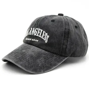 Close-up of Los Angeles vintage embroidery on washed dark grey cotton baseball cap