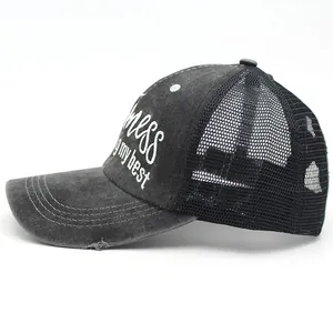 Distressed dark gray ponytail baseball cap with mess embroidery and mesh back