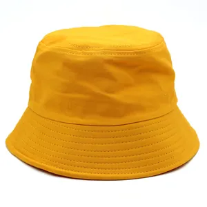 Bright yellow solid color cotton bucket hat for outdoor sun protection with stitched brim