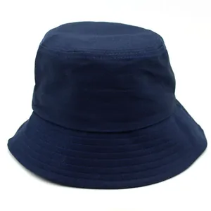 Detailed close-up of dark blue cotton bucket hat showing quality stitching and fabric texture