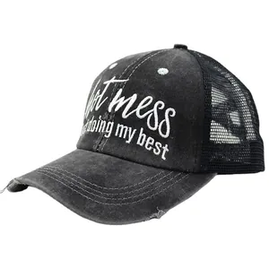 Black washed cotton ponytail baseball cap with Hot Mess embroidery and mesh back