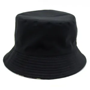 Black canvas bucket hat with alien spaceship print featuring a wide reinforced brim style