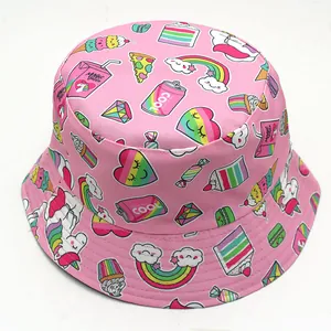 Pink reversible sun hat with colorful cartoon unicorn, rainbow, and dessert patterns