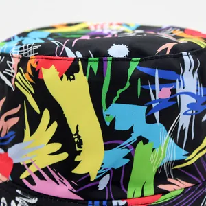 Double-sided bucket hat with vibrant graffiti print on black durable canvas fabric