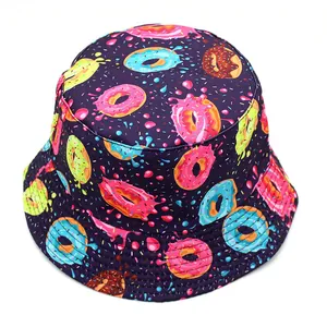 Top view of bucket hat with colorful donut print on deep purple twill fabric detail
