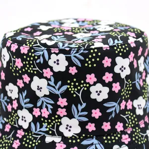 Chapeau bob réversible pour protection solaire avec motif floral sur coton noir