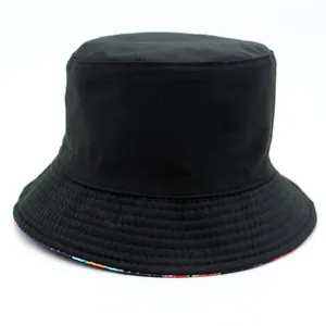 Classic black bucket hat with donut pattern lining, reversible cotton sun hat for outdoors