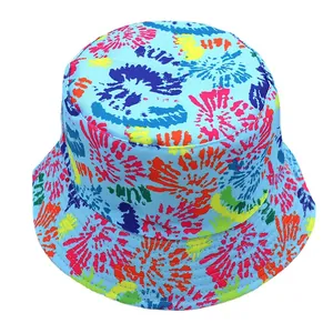 Bright blue reversible bucket hat with colorful abstract spray-paint patterns for outdoors