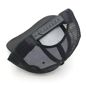 Detail of adjustable black mesh trucker hat showing snapback closure and breathable fabric