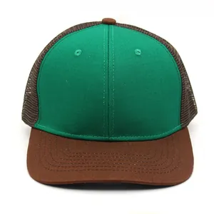 Detail of green and brown contrast trucker hat with breathable mesh and neat stitching