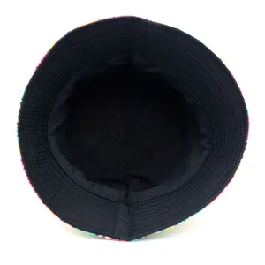 Reversible bucket hat with colorful banana print and breathable black inner lining
