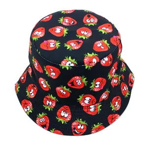 Double-sided bucket hat with red cartoon strawberry print on a black canvas fabric