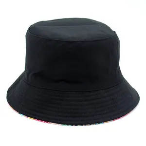 Double-sided cotton bucket hat with banana print and parallel stitching in black