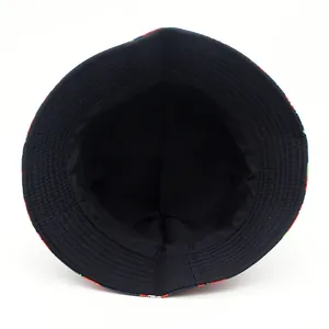 Double-sided reversible bucket hat with strawberry print and black cotton sun protection