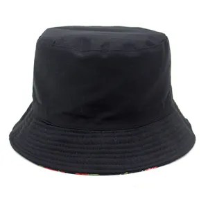 Black reversible cotton bucket hat with strawberry print lining and reinforced brim stitching